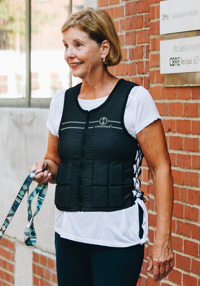 female wearing hyper vest fit weight vest for building bone density osteoporosis osteopenia