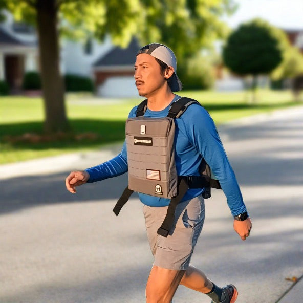 image of a man rucking with a 40lb hyper vest weight vest