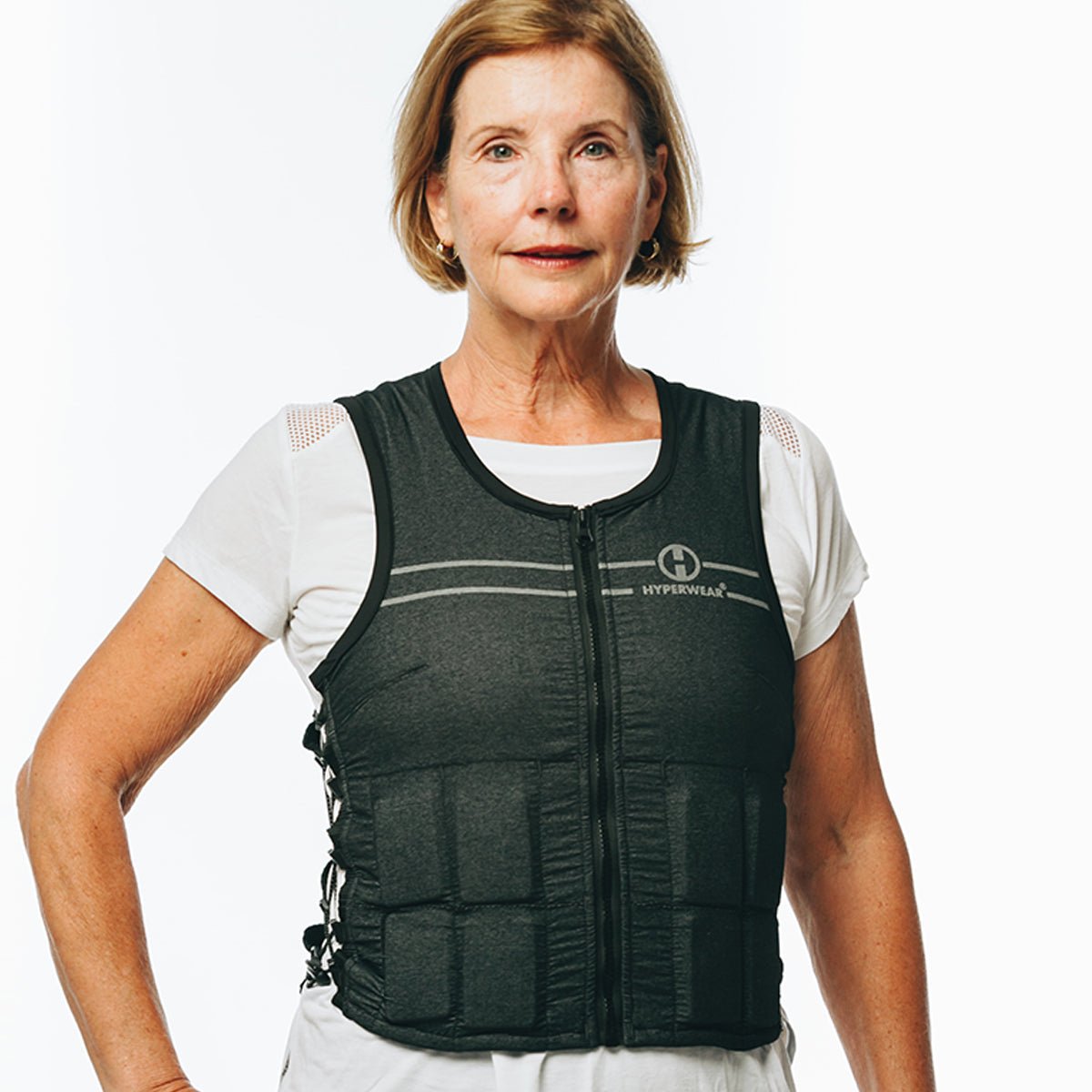 image of a woman modeling the hyper vest FIT weighted vest for women
