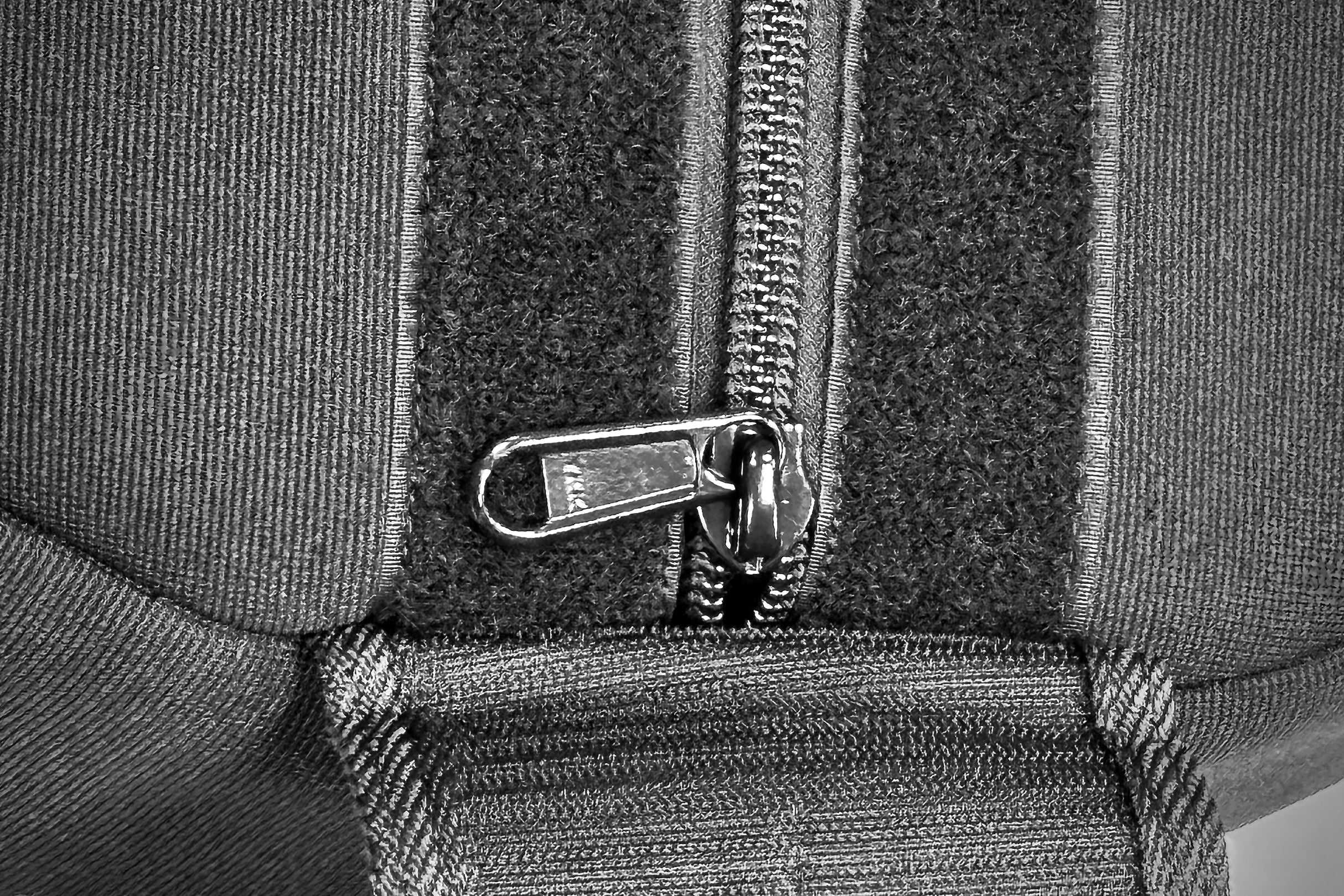 Close up photo of the YKK zipper and velcro closure of the hyperwear neoprene strongman sandbag